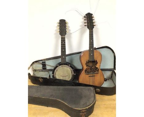 A small string banjo style instrument (56cm) and a ukuele with tortoiseshell effect exterior below strings, bears stamp verso