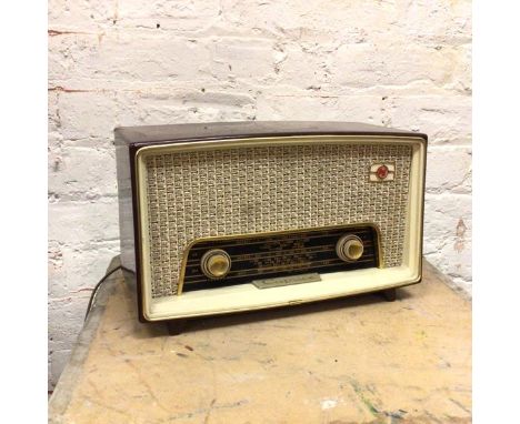 A vintage Caprice radio, model R31 (23cm x 37cm x 16cm)