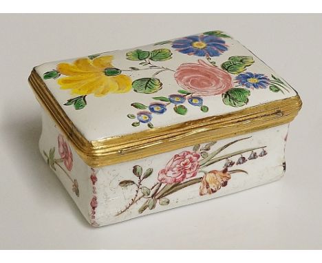 An early 19th Century enamel rectangular pill box, the hinged lid painted with flowerheads and leafage, the waisted sides wit