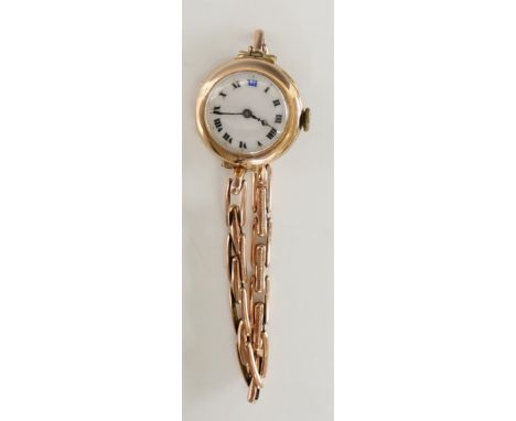 A 9ct gold ladies wristwatch the white enamel dial with Roman numerals, expanding 9ct gold bracelet, 22gms gross