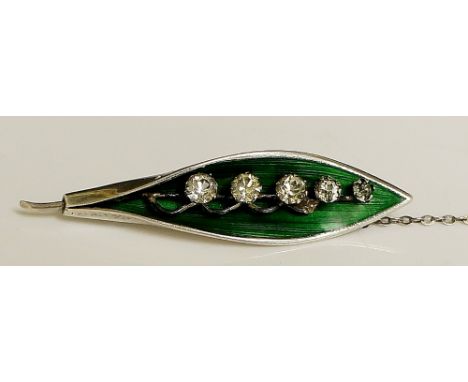 A silver enamel and paste brooch modelled as a leaf bud, 4.7cm wide by AJS Birmingham 1945, bearing registration number 61298