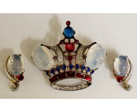 Trifari - a silver and paste set crown brooch set blue, red, white and moonstone cabochons, 5cm wide, stamped Trifari, sterli