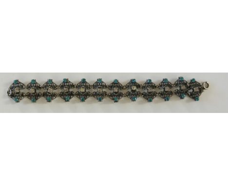 A vintage bracelet set turquoise and white glass brilliants on a filigree frame, 1950s/60s