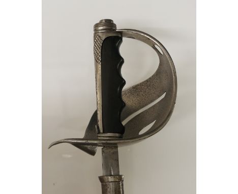 An 1848 pattern Italian light cavalry sword with pierced basket, ebonised chequered grip, steel scabbard, the blade engraved 