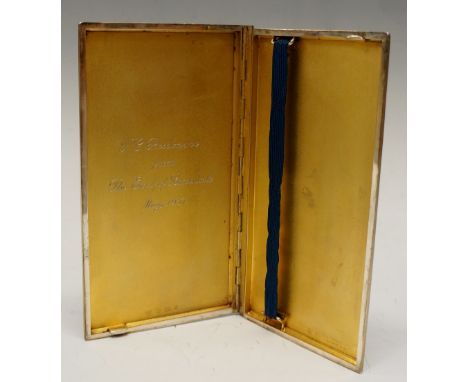 A good Garrad and Co. silver cigarette case, the exterior engine turned with bevelled edges, slide open to reveal gilded inte