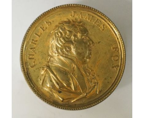 George III, Political, Charles James Fox, round snuff or cashew box, gilt copper c55x24mm, the lid with an embossed portrait 