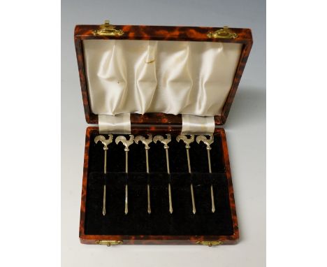 A set of six white metal cocktail sticks, each with applied rooster finials, each stick marked epns, made in England, each 8c