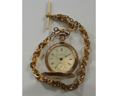 A fine quality Columbus Watch Company gold plated Hunter pocket watch with foliate engraved case, the front with vacant shiel