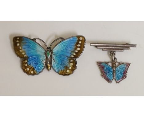 A sterling standard enamelled butterfly brooch, 4cm wide; a silver and enamel lapel butterfly brooch, 2.3cm high (2) (larger 