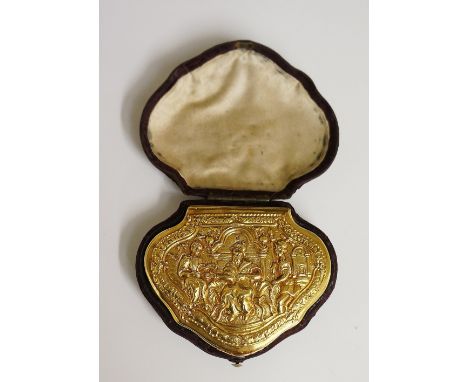 A fine gold sabretache of cartouche shape the hinged lid cast with a seated figure flanked by a pair of figures before an arc