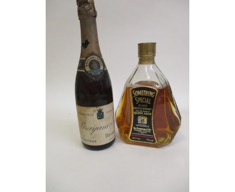 A boxed bottle of Something Special De Luxe Scotch Whisky, together with a 1923 vintage Brayant &amp; Fils Champagne 