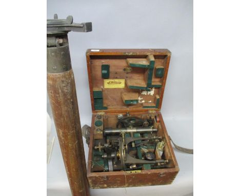 A Troughton &amp; Simms Ltd theodolite and stand with accessories, in a mahogany box and a tripod stand 