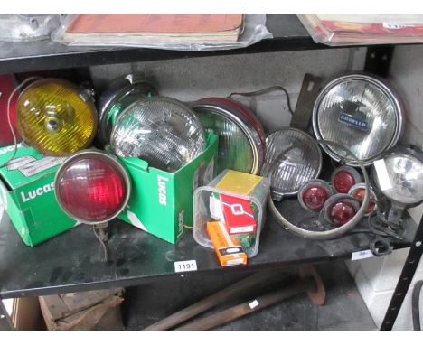 A large collection of new boxed and used headlamp, fog lamps, indicators and stop lights