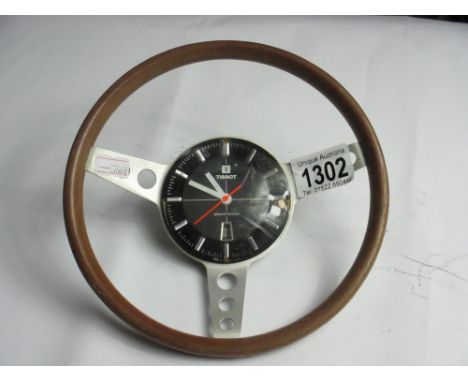 A vintage Tissot steering wheel clock