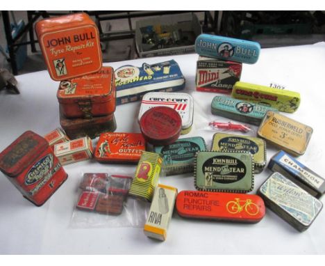 A quantity of vintage boxed car light bulbs, John Bull tyre repair kit tins etc