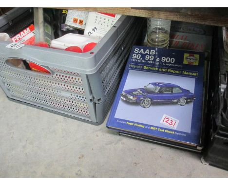 A good large collection of polish, paint and books, workshop manuals and stationary engine car magazines