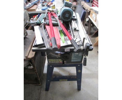 A good steel / alloy bench, an electric motor and a large bolt cropper