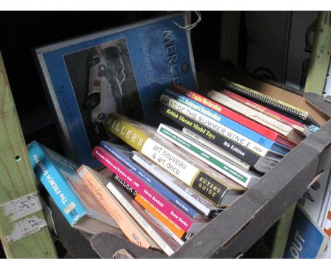 A box of various books including Bodywork Restoration,  Engine Restoration and