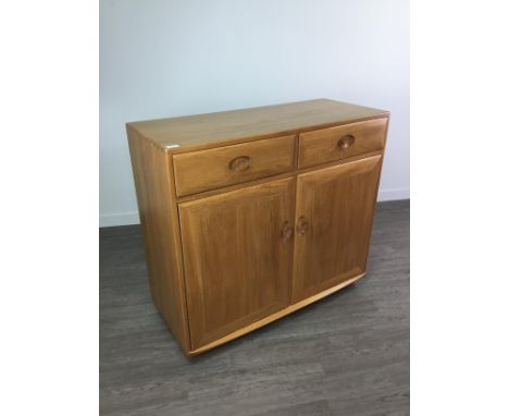 ERCOL WNIDSOR CUPBOARD CHEST, fitted with two drawers over two doors, 104cm wide x 94cm high