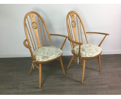 SET OF FOUR ERCOL SWAN BACK DINING CHAIRS, with cushion seats, including two carvers