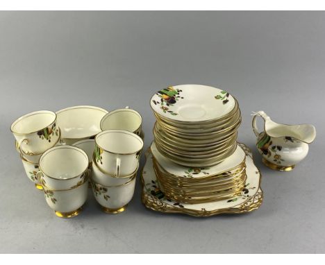 TUSCAN PART TEA SERVICE, with floral and gilt decoration, comprising eleven cups, twelve saucers, eleven side plates, two cak