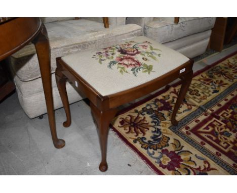 An early 20th Century tapestry footstool