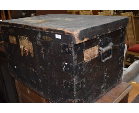 A vintage wooden travel trunk, including vintage shipping labels relating to Blue Star Line and Gold Coast/Trinidad interest