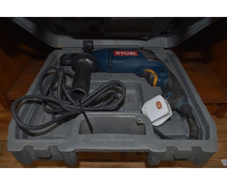 A corded Ryobi hammer drill