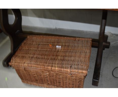 A traditional wicker picnic or similar hamper