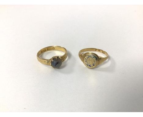 An Edinburgh 18ct gold celadon jadeite cabochon ring (Q) and an 18ct gold enamelled signet style ring (P) (combined: 6.08g)