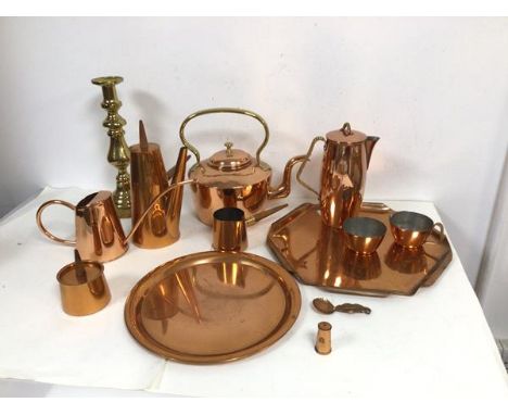 An assortment of copper and brass including a Swedish Ystad- metall coffee pot with copper exterior and cane knop and handle,