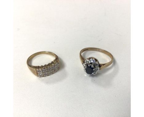 A 9ct gold diamond cluster ring, set central blue stone in claw setting (O) and another gold ring markings worn, with chequer