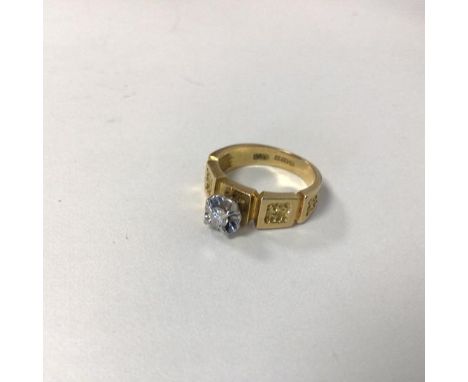 An 18ct gold ring, set single diamond in claw setting (I) (4.23g)