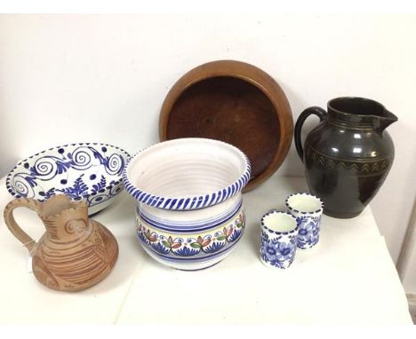 A polychrome ceramic planter of squat baluster form, a ceramic bowl and similar designed pair of mugs, a terracotta jug, a gl