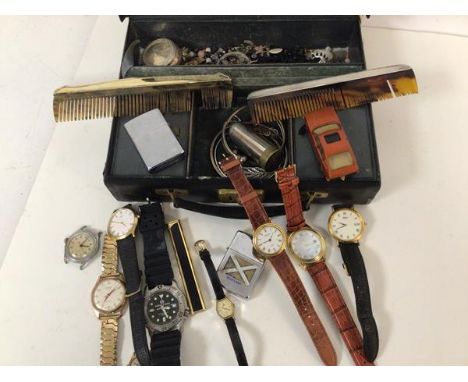 A mixed lot including gentleman's and lady's wristwatches, lighters, silver backed comb and silver bangle, with other assorte