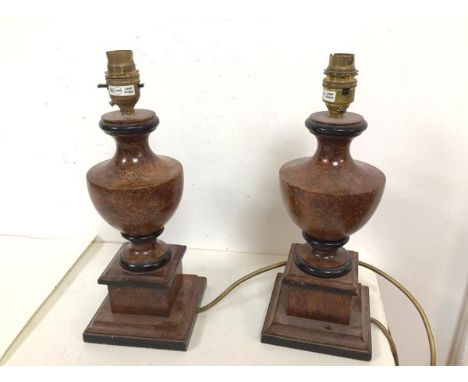 A pair of wooden table lamps of urn form on plinths, with painted stone effect (32cm to top of lamp holder)