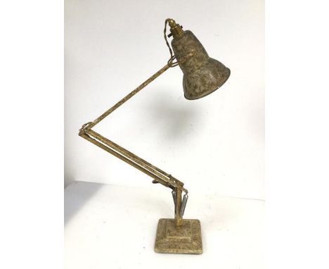 A mid 20thc anglepoise table lamp with mottled gilt finish, the shade with rolled edge to bottom, on adjustable stem, marked 