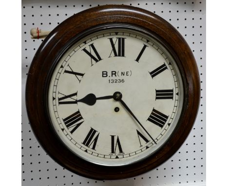 A British Railways North Eastern circular wall clock, white dial with Roman numerals, inscribed 13236, early 20th century 