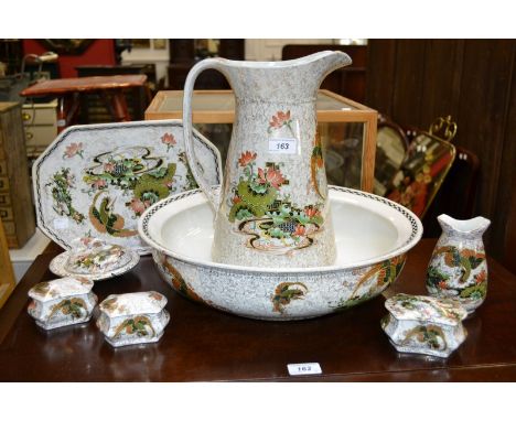 A Staffordshire Phoenix Ware wash set, comprising jug and bowl, dressing table tray, tooth brush jar, soap dish and cover, tr