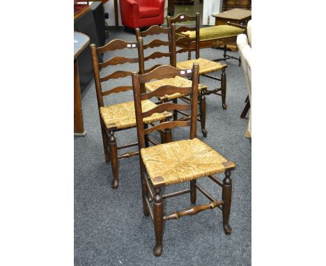 A set of four rush seat ladder back chairs, 19th century