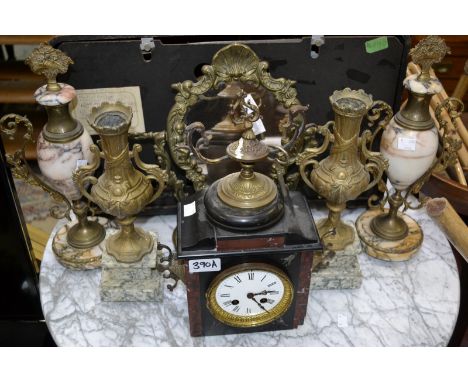 Two pairs of marble and gilt metal mantel garnitures; a Belge Noir mantel clock (missing plinth); a gilt framed dressing mirr