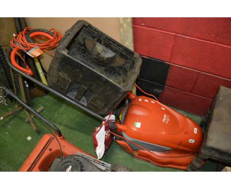 A Flymo hover compact 300 lawn mower