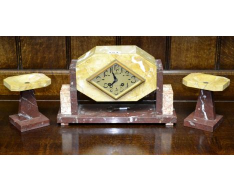 An Art Deco marble clock garniture, Diedisheim Nantes,  lozenge shaped body, diamond shaped dial, Arabic numerals, rouge marb