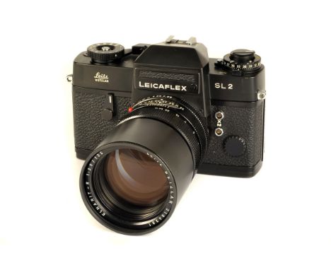 A Leica Leicaflex SL2 SLR Camera, black, serial no. 1423303, with Leitz Elmarit-R f/2.8 135mm lens, black, serial no. 2194391