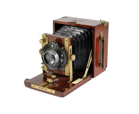 An Unmarked Mahogany Hand & Stand Camera, 3x4”, possibly J. H. Dallmeyer, with Plaubel Anticomar f/3.2 100mm lens, aluminium,