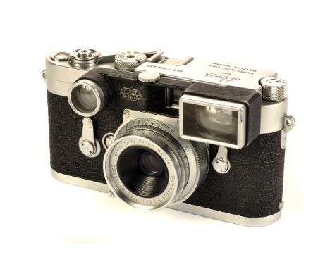 A Leica M3 Rangefinder Camera, chrome, serial no. 958437, with Leitz Summaron f/3.5 35mm lens, chrome, serial no. 1553862, bo