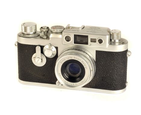 A Leica IIIg Rangefinder Camera, chrome, serial no. 880151, with Leitz Elmar f/2.8 50mm lens, chrome, serial no. 1539547, bod