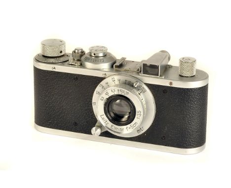 A Leica Standard Model E Camera, chrome, serial no. 251335, with Leitz Elmar f/3.5 50mm lens, chrome, serial no. 344132, body