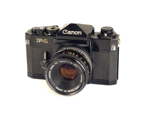 A Canon F-1 SLR Camera, black, serial no. 223574, with FD f/1.8 50mm lens, black, serial no. 740069, body, G, shutter working