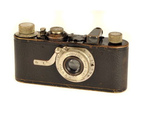 A Leica Model Ia Camera, black, serial no. 37888, with Leitz Elmar f/3.5 50mm lens, nickel, body, F, shutter working, lens, G